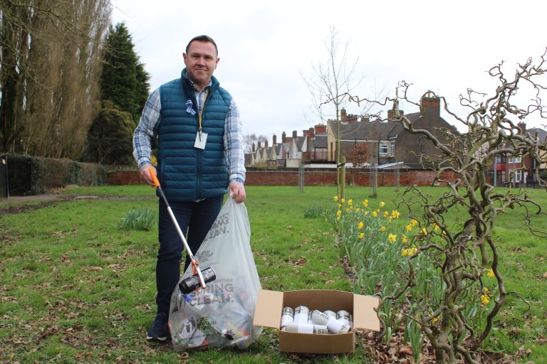 Cllr Michael Wyatt showcasing the litter pickers and bags available