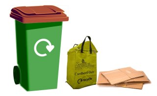 Garden waste bin and yellow recycling bag with a stack of extra cardboard